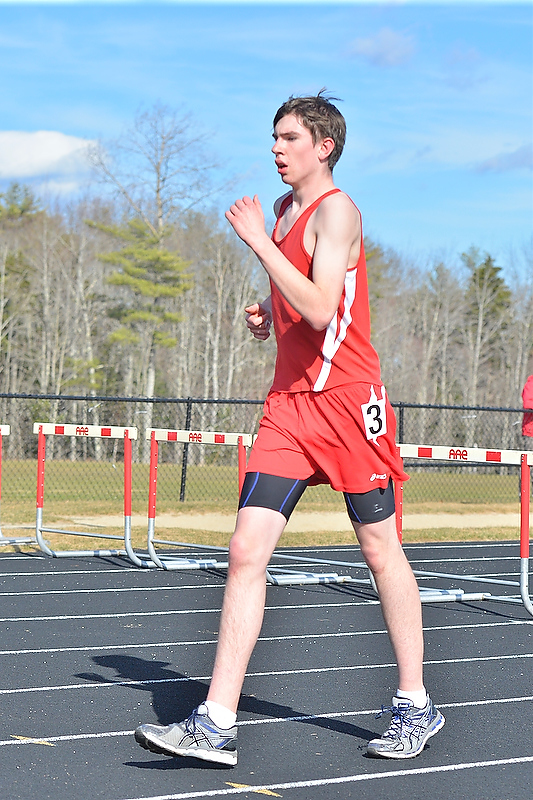 Camden Hills Ryan Shields heading for the finish line in the 1600 meter race walk. (Photo by Ron Hawkes)