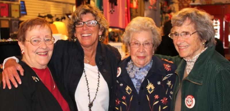 During a reception for previous employees on Friday night, Meg Quijano (second from left), is flanked by Claire Frye on her left, who still works at the store and Winnie Snow and Sally Robbins, both in their 80’s who worked at the store when they were younger. (Photo by Ellen Curtis).