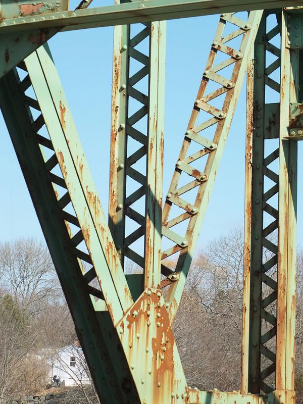 Fatigued and rusting trusses.