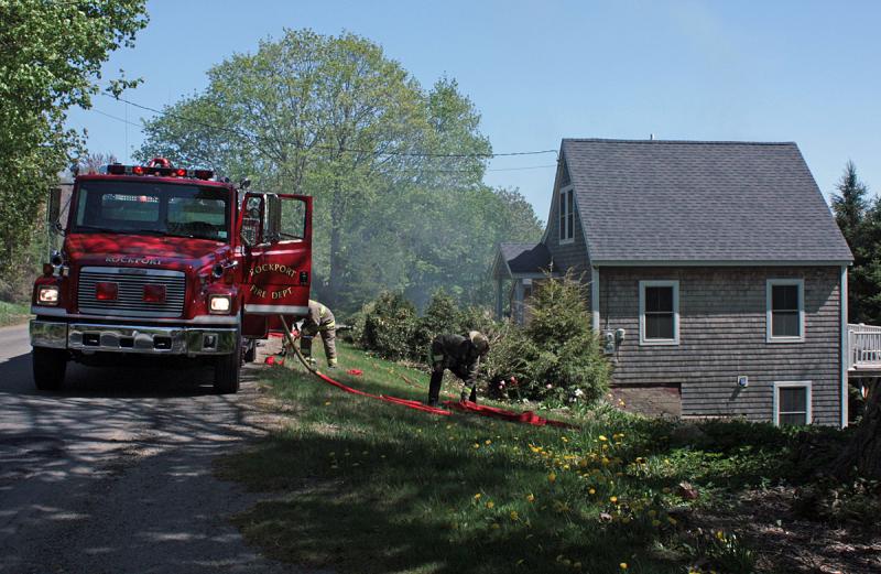 A line is set up from a Rockport on John Street Thursday afternoon. (Photo by Holly S. Edwards)