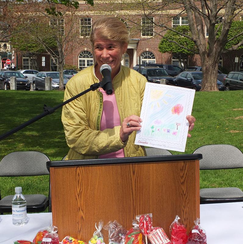 Karen Brace announces the winners for the Design-a-Stamp Contest.