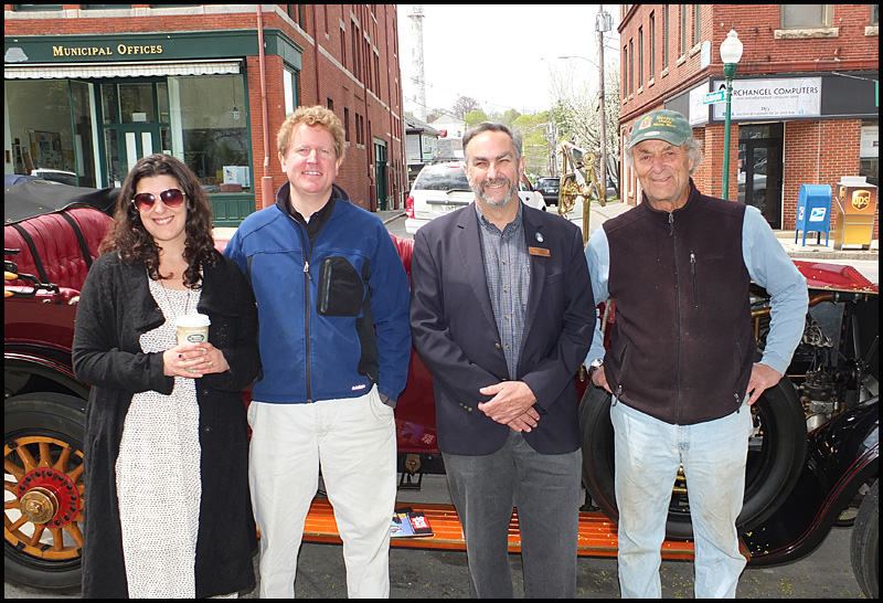 Jenna Lookner with Ethan Yankura, both with the Owls Head Transportation Museum, Sen. Dave Miramant and Leonard Lookner stand in front of the museum’s 1913 Rolls Royce that was brought down for the ceremony.