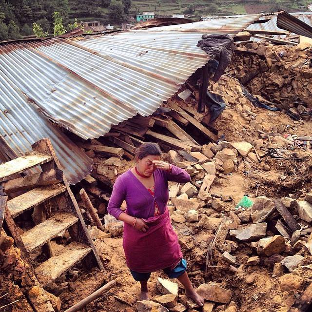 40-year-old Adimaya Tamang breaks down as she sees her broken house in Phalame, Nepal. A single mother, with two children, the house and her livestock were her only support system. All her livestock died in the quake. Photo by @prashanthvishwanathan, (Photo courtesy of the Nepal Photo Project)