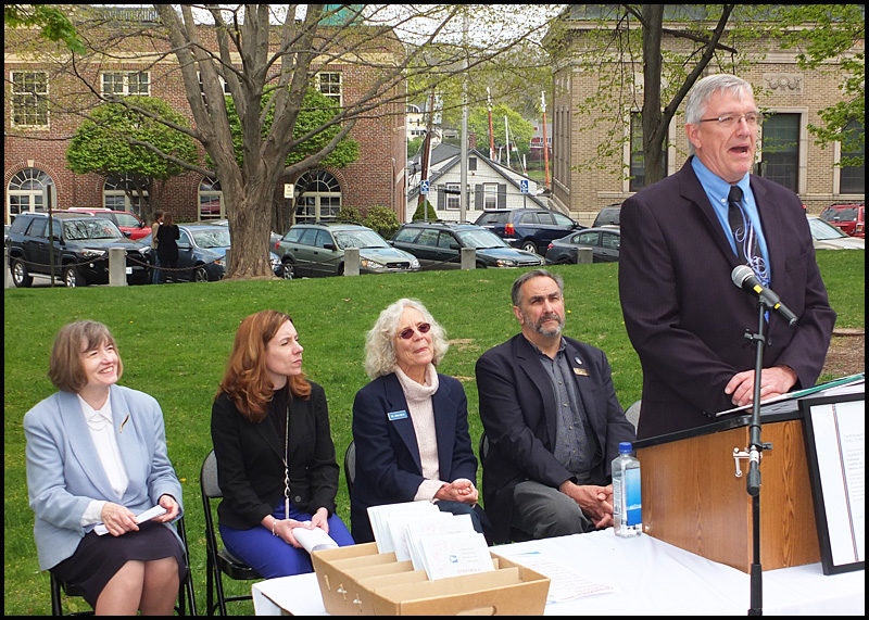 Steve Dalessandro addresses the audience. Behind him seated from left: Patricia Finnegan, Kathleen L. Walker, Rep. Joan Welsh and Sen. Dave Miramant.