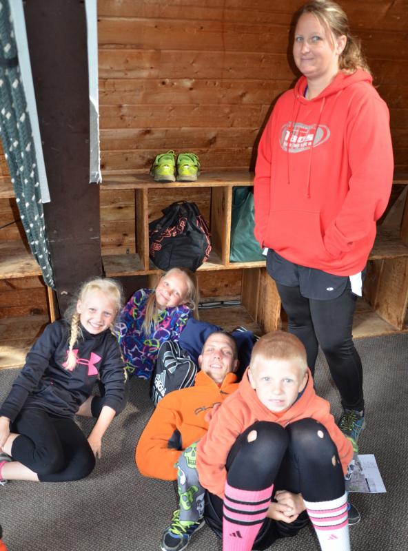 Shawn St. Cyr and his family are prepping to run the race, with a little relaxing in the lodge. (Photo by Lynda Clancy)