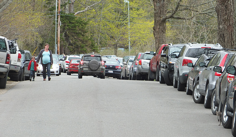Russel Ave. in front of the farm was lined with cars.
