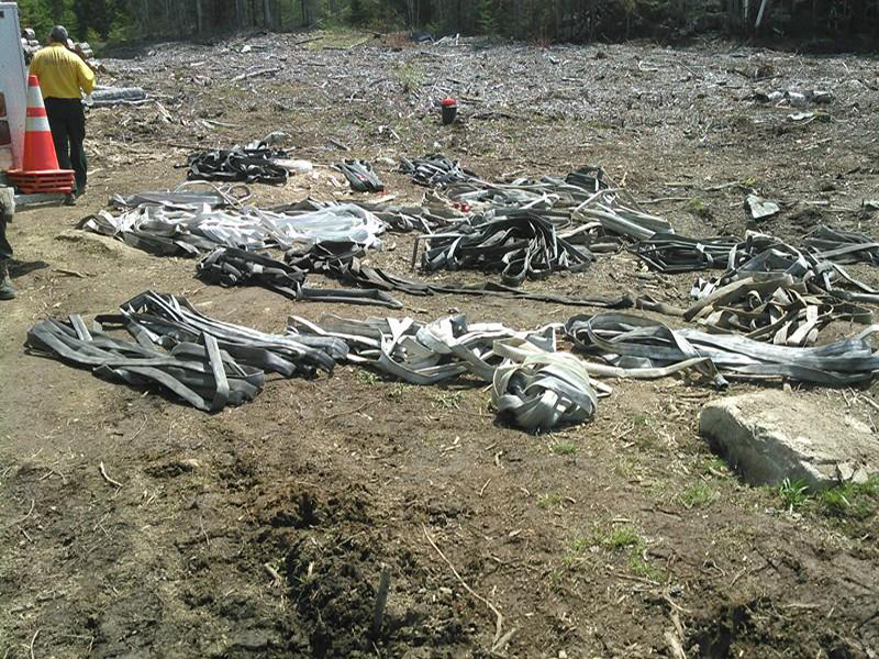 All that’s left to do now, after firefighters were able to finally get the Jackson Road Woods Fire in Searsmont at 98 percent contained, is to clean and repack the forestry hose in preparation for the next one. (Courtesy Tracy Harford)