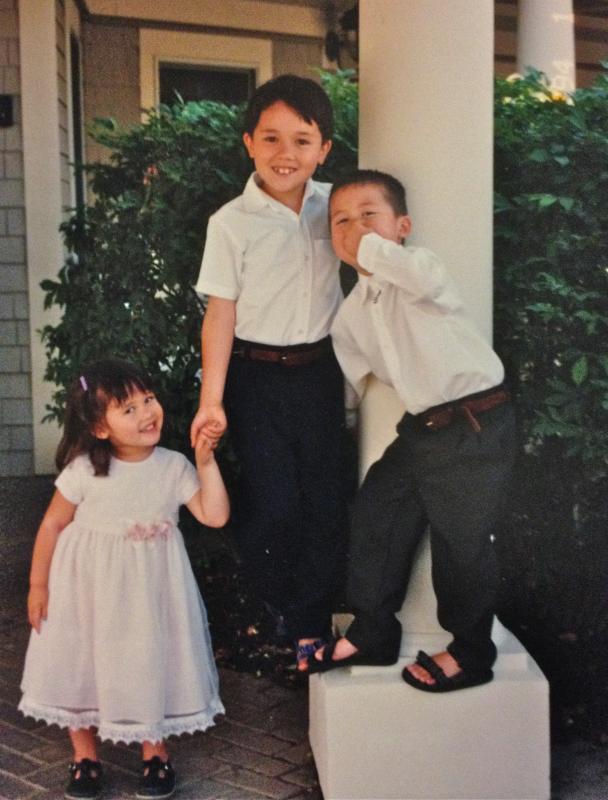 From left, the Gordon siblings, Harper, 2, Devon, 6, and Aidan, 4, in front of Windward Gardens. (Photo courtesy the Gordon family)