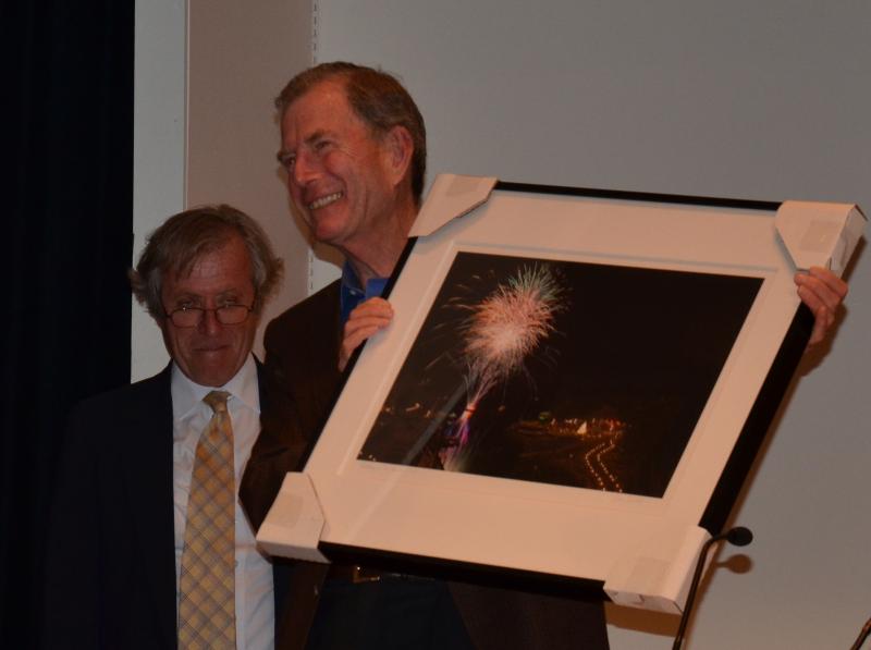 Charlton Ames is honored by his colleagues with a Peter Ralston photo of what Ames really likes — fireworks!