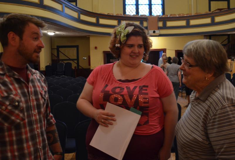 Owen Casas, Heaven Bartlett and Stephanie Kumble visit after the meeting.