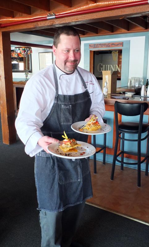 Chef Stephen Richards serves the second course. SUZI THAYER/Boothbay Register