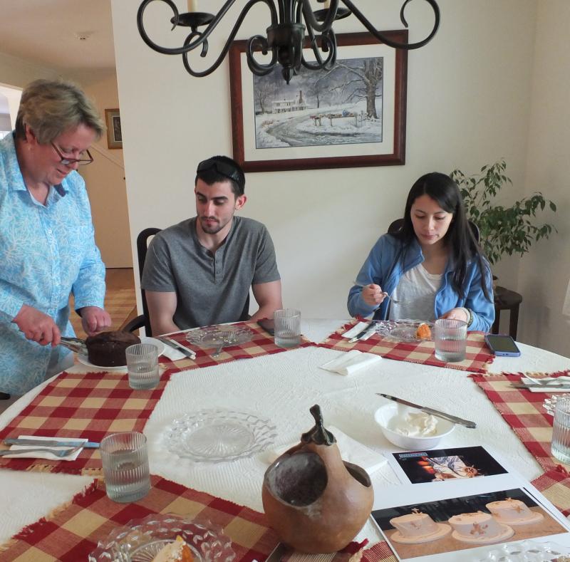 Patricia Moroz serves delectable dark chocolate cake to the lucky winning couple of the $100,000 wedding from Real Maine Weddings. SUZI THAYER/Boothbay Register