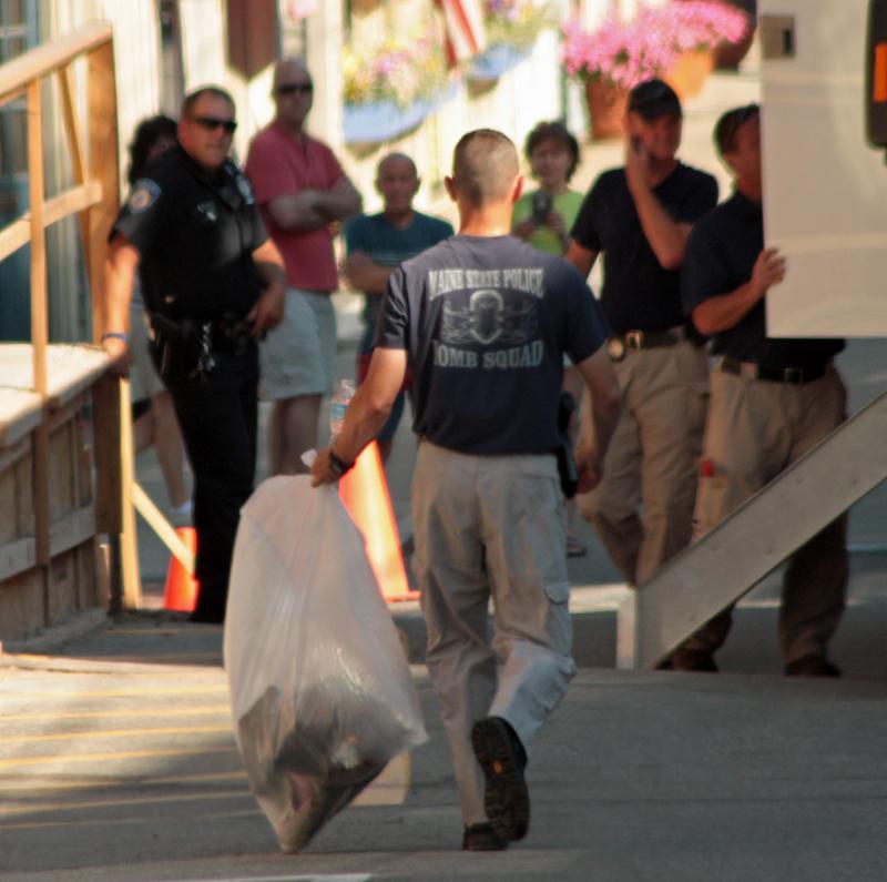 The bagged remains of the detonated backpack. (Photo by Holly S. Edwards)
