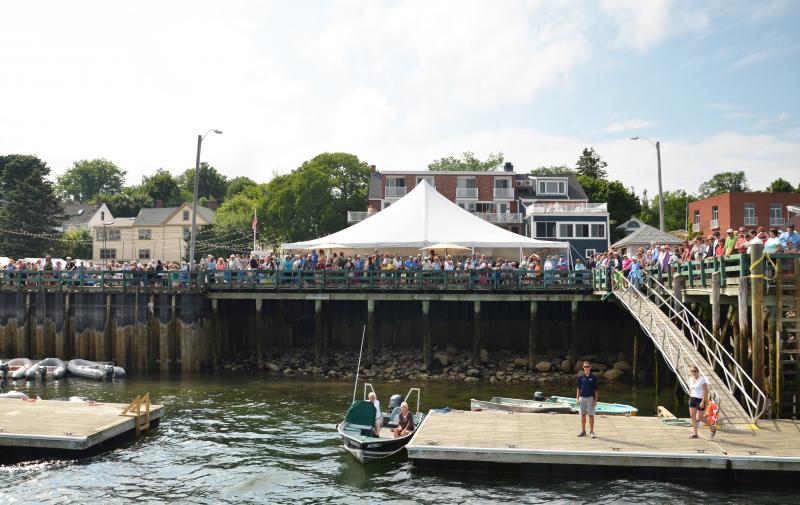 Castine’s public landing is filled with cheering admirers. (Photo by Lynda Clancy)