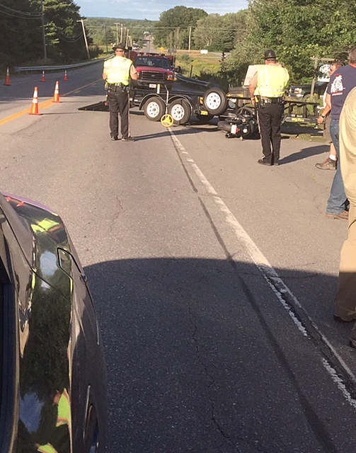Eugene Neild’s motorcycle left behind a long skid mark after he attempted to stop from crashing into the truck and trailer that turned in front of him in Warren. (Photo by Holly S. Edwards)