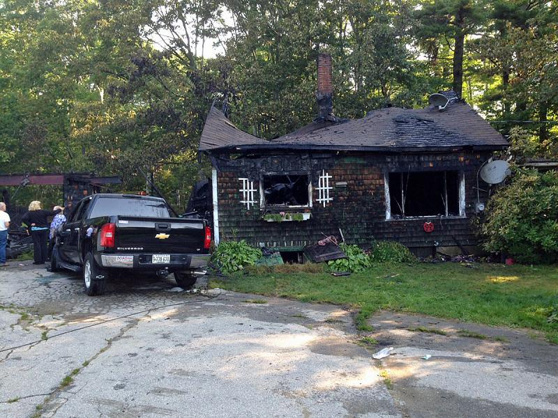 Investigators with the Maine Fire Marshal’s Office remain Sunday morning at 2 Virginia Drive in Lincolnville. (Courtesy Camden Fire Department)