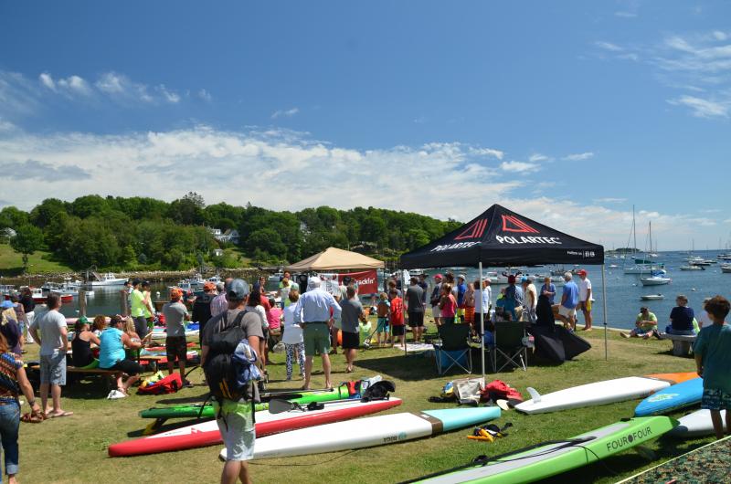 The participants in the annual Lobster SUP Cup gather after the races. (Photo by Lynda Clancy)