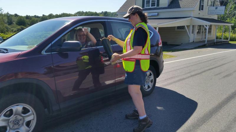 Royan Bartley, wife of firefighter Neal Bartley, made volunteering at the “toll booth” a family affair. (Photo by Sarah Shepherd)