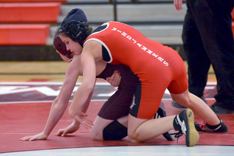 Hilary Merrifield wrestling Kolin Fraser from Nokomis back in 2013 as a freshman. (Photo by Ron Hawkes)