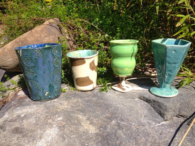 Cups made from clay thrown by students at Hope Elementary School.