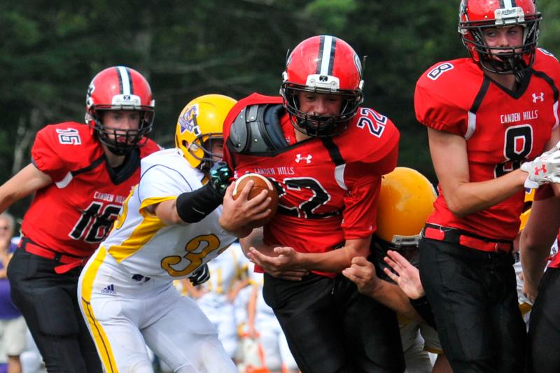 Plays like this are what the fans of Camden Hills football will miss. (Photo by Ron Hawkes)