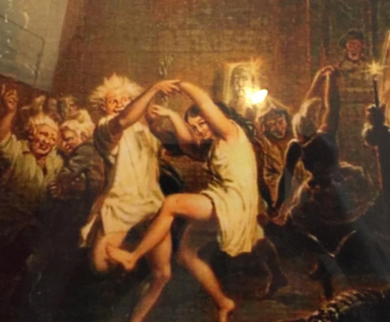 Art on the wall: A print of a scene from 'Tam o' Shanter': Witches Dancing in Alloway Auld Kirk, by Joseph Bartholomew Kidd.