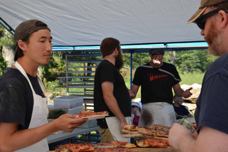 Cafe Miranda’s crew kept the pizza oven burning. (Photo by Lynda Clancy)