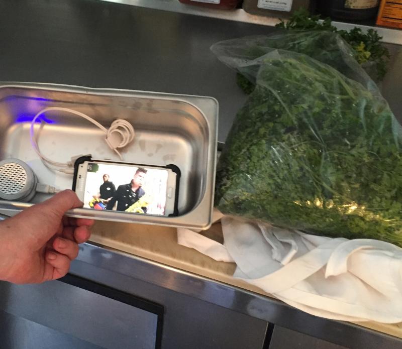 Music in the pan keeps the kitchen moving.