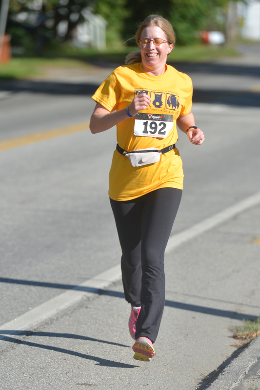 Kate Varns of Minnesota was the first female to cross the finish line. (Photo by Ron Hawkes)