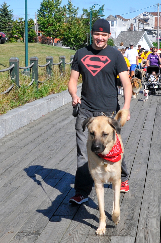 The walk along the Rockland Boardwalk was part of the one-mile dog walk. (Photo by Ron Hawkes)