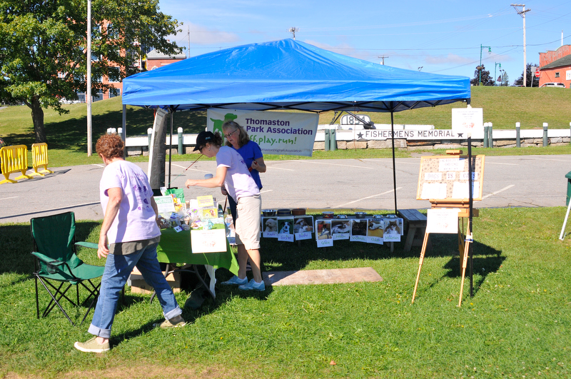 The vendors at the event were knowledgeable people about dogs. How to train them, how to care for them, what to feed them. A lot of information was available. (Photo by Ron Hawkes)