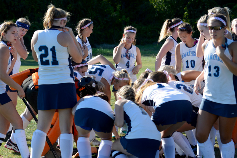 Oceanside players are ready for the game. (Photo by Ron Hawkes)