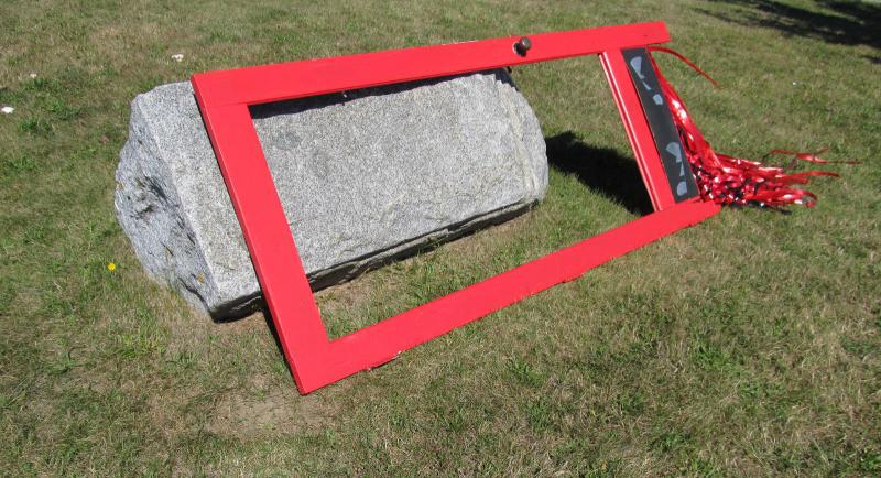 Alexis Iammarino put together a red door out of the discarded materials. (Photo by Kay Stephens)