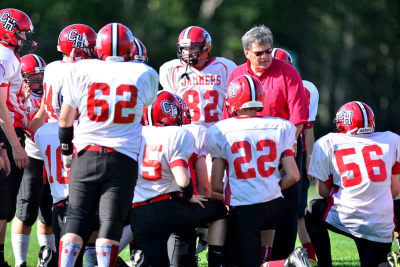 Camden Hills coach Thad Chilton with his team prior to the start of a game. Chilton was in his first year as the varsity coach at Camden Hills Regional High School. (Photo by Ron Hawkes)