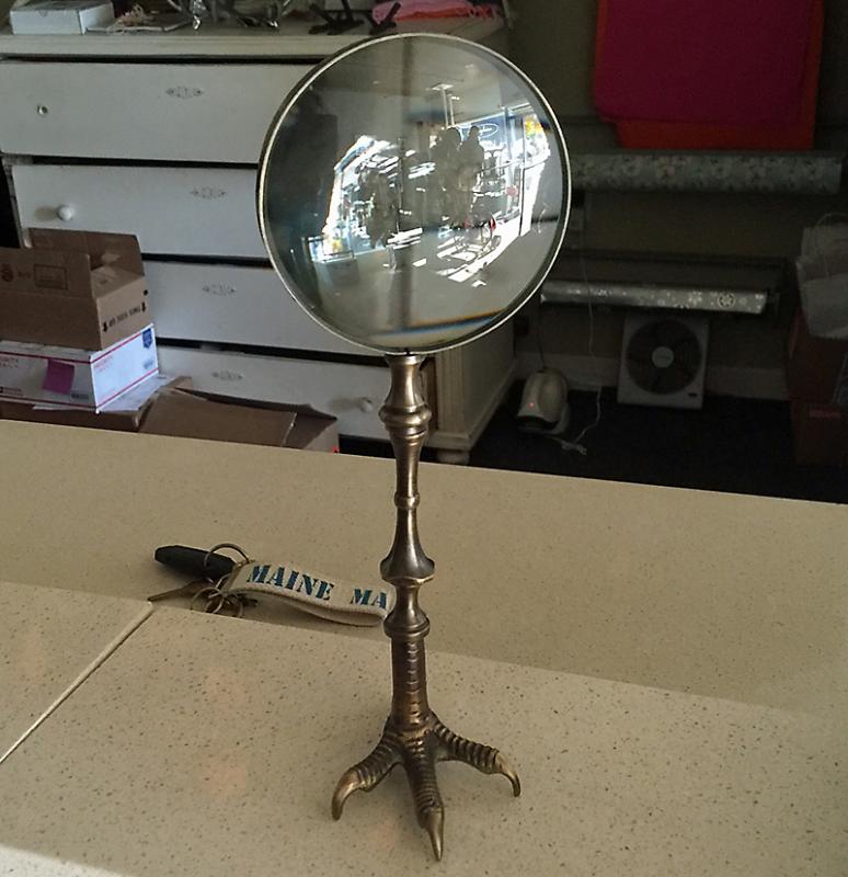 This magnifying glass won’t likely be sitting in the window of Josephine anymore. (Photo by Holly S. Edwards)