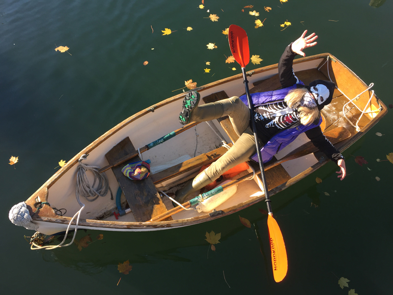 Eliza Massey has a little fun while helping move skiffs around so the town can continue to slowly - but surely - remove floats for the season. (Courtesy Peter Ralston)