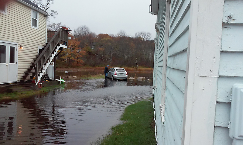 Nanette Gionfriddo of Beyond The Sea at Lincolnville Beach said a neighbor phoned to warn her to move her car Thursday morning, as the high tide began flooding Frohock Brook. (Courtesy Nanette Gionfriddo)