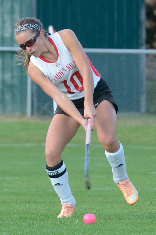 Camden Hills Emily Daggett drives the ball from midfield. (Photo by Ron Hawkes)