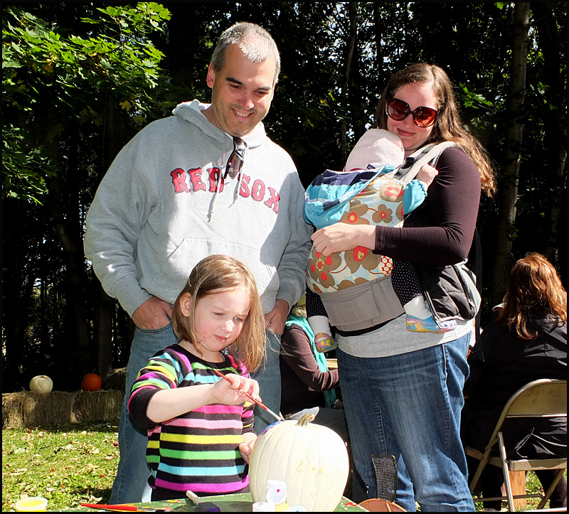 Andrew, Vanessa, Rosa and Nora Leigh, of Freeport. Nora tried her hand at pumpkin painting.