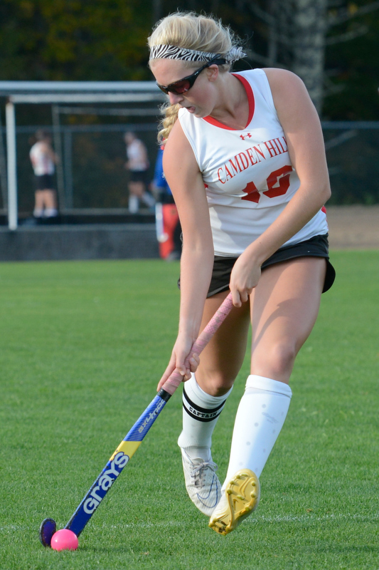 Camden Hills Willow Grinnell carries the ball up the sideline. (Photo by Ron Hawkes)