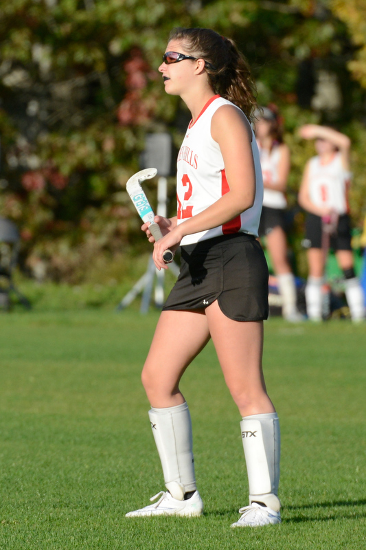 Camden Hills Hilary Merrifield watches as Winslow plays a corner. (Photo by Ron Hawkes)