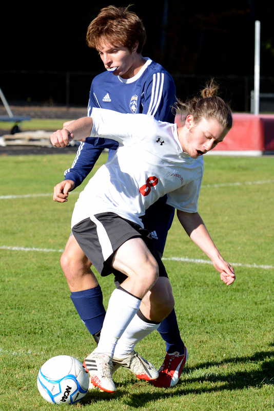 Camden’s Kienan Brown uses some fancy footwork and quick feet to get control of the ball. (Photo by Ron Hawkes)