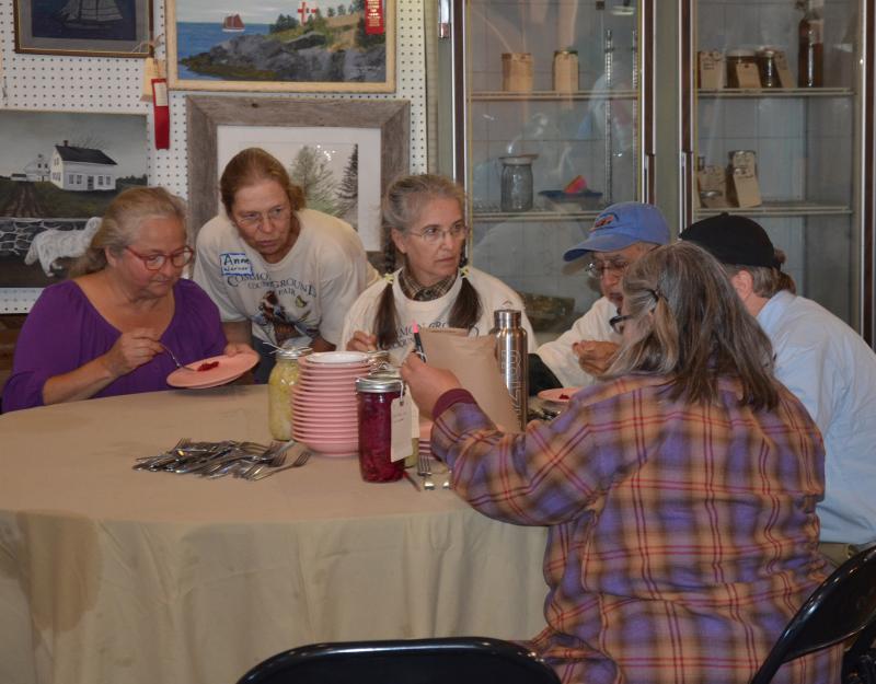 Testing the fermented products. (Photo by Lynda Clancy)