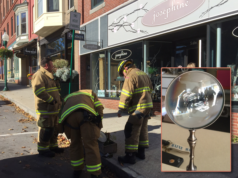 A passerby called 911 Thursday morning around 9 a.m. after they saw window decorations smoldering on a table inside the Josephine store at 5 Elm St. in downtown Camden. (Photo by Holly S. Edwards)