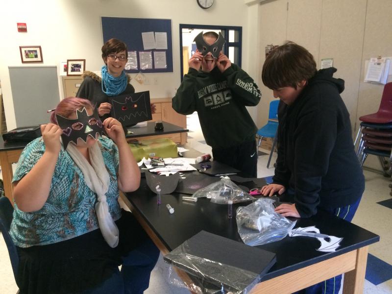 Medomak Middle School students show off their bat masks. (Photo by Madelon Kelly)