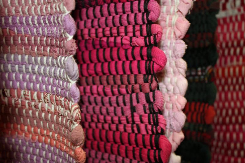 Black warp with pink fabric makes this rug ‘pop,’ said Diane O’Brien.