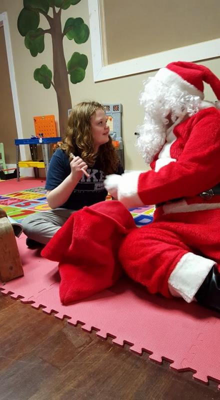 Kailee Richardson- Santa was great about getting down on her level which made her feel much more comfortable with him.