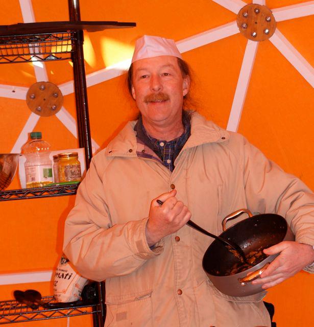Chef Mike, serving up his famous vindaloo inside the geodesic dome at the U.S. National Toboggan Championships at the Camden Snow Bowl.