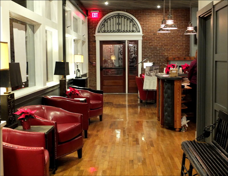Polished floors and rich upholstery greet you when you enter.