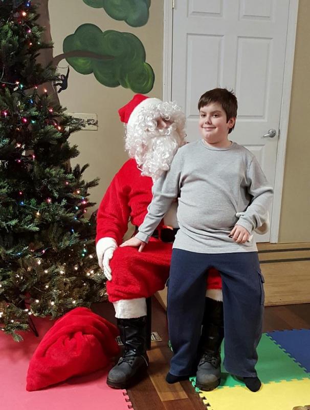 Thane Waddell gets a chance to sit on Santa’s lap.
